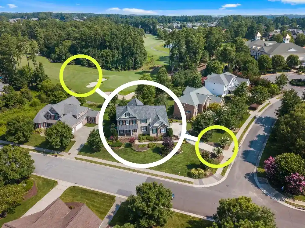 Aerial view of a residential property with highlighted boundaries and features