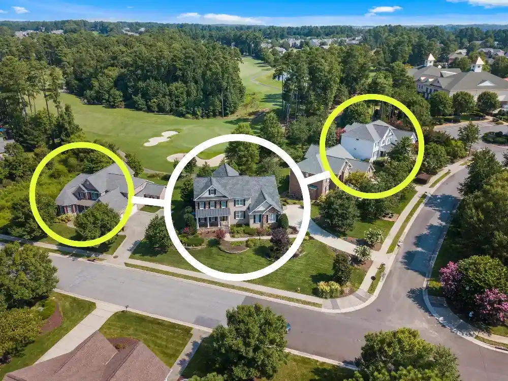 Aerial view of a residential property with highlighted surrounding homes